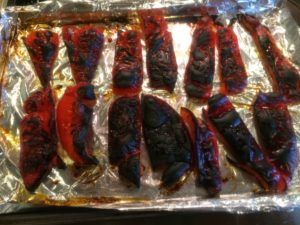 Photo of blackened red peppers.